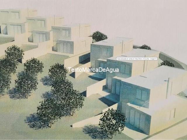 CASA ADOSADA EN OS ÁNXELES, BRIÓN.